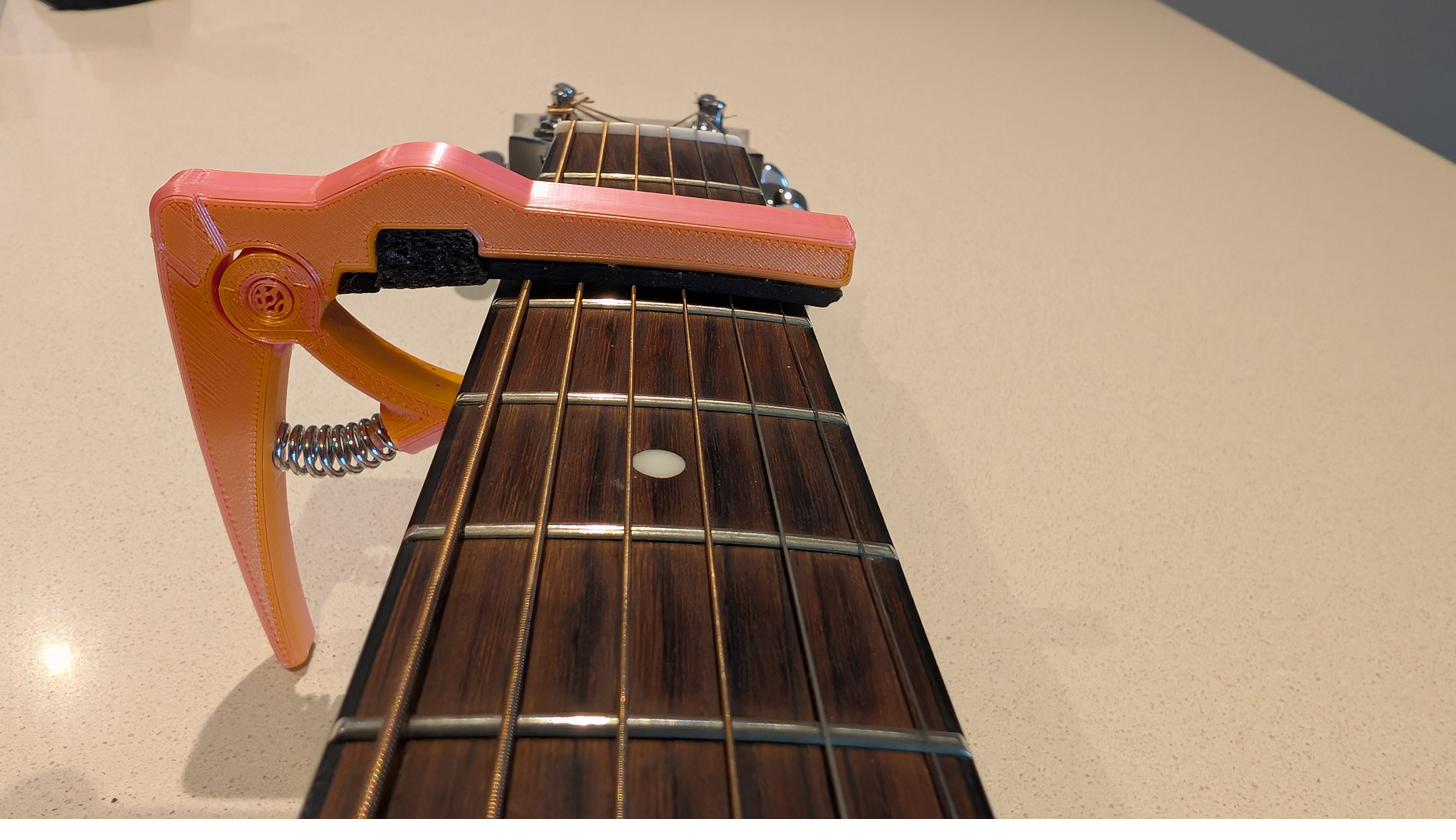 Omega Capo higher up the neck in standard capo mode, clamping all six strings